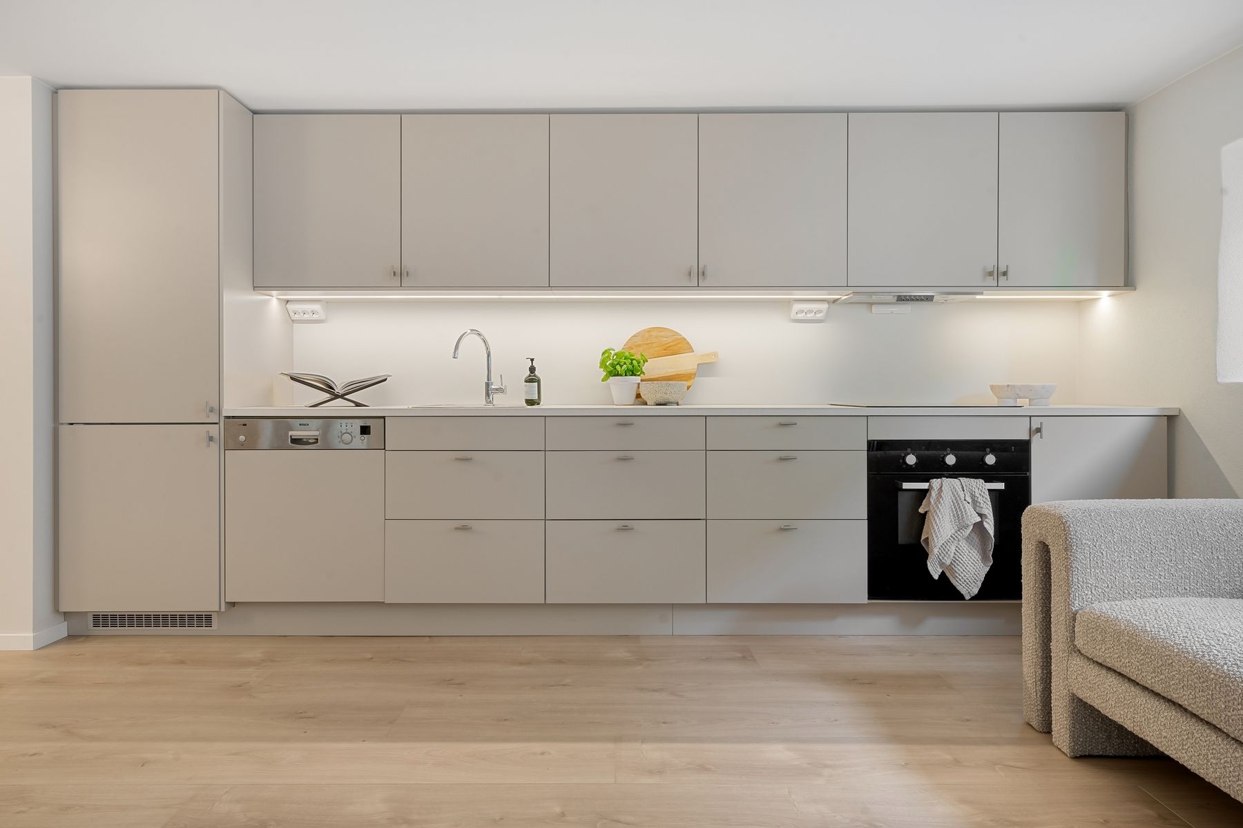 Minimal modern kitchen with wood and light finishes