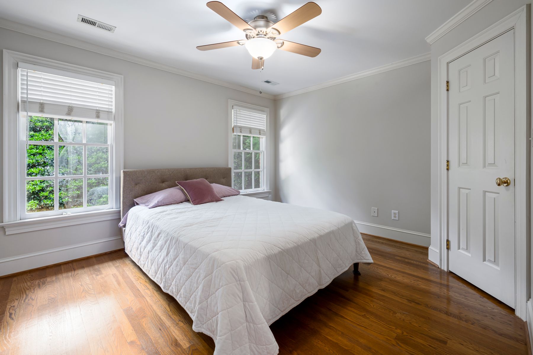 Freshly prepared bedroom with crisp white bedding